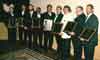 The group of inductees that had been awarded the Outstanding Contribution to the Martial Arts at the World Martial Arts Hall of Fame on July 12, 1997. Inductee are from left to right. Sensei John L. Bennett Jr., Kumu Joseph Kahapea Jr., Sensei Skip Koepke, Kancho Sensei Tony Kull, Sensei Dan McGeough, Sensei Ronald Reekers, Master Steve Spry, Kyoshi Sensei Edward E. Wilkes, Sifu James L. Willis II.